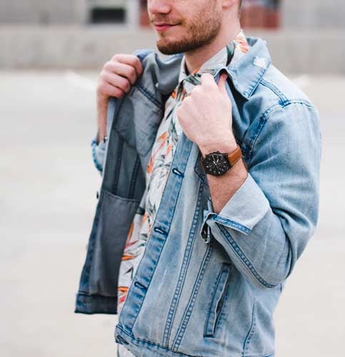 Outfit featuring a bold patterned shirt and a jean jacket