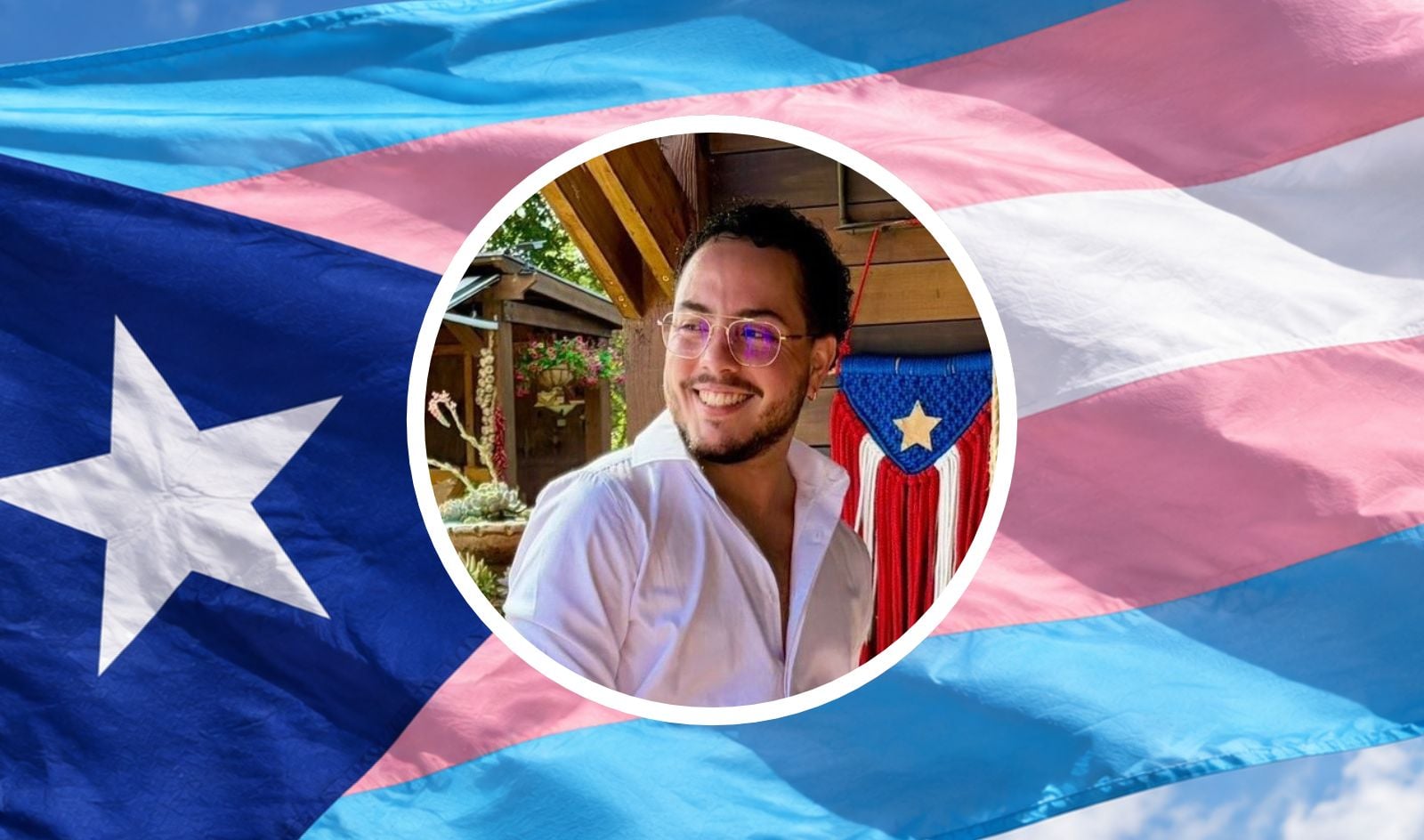 David's headshot in front of a trans pride Puerto Rican flag