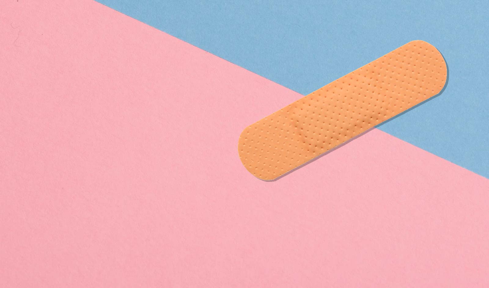 Bandaid on pink and blue background