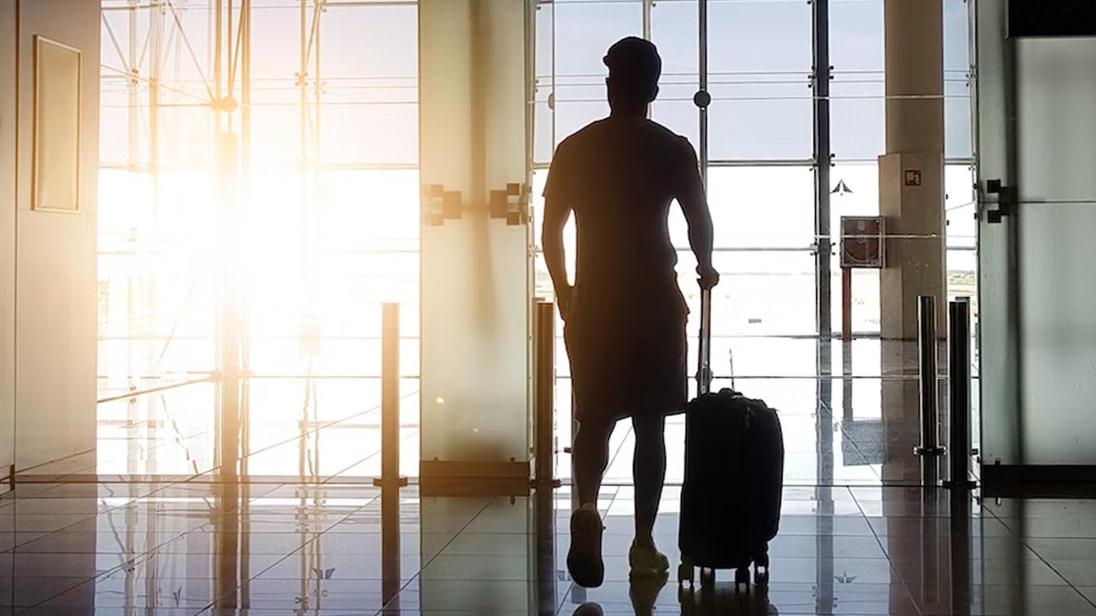 Person in airport with luggage