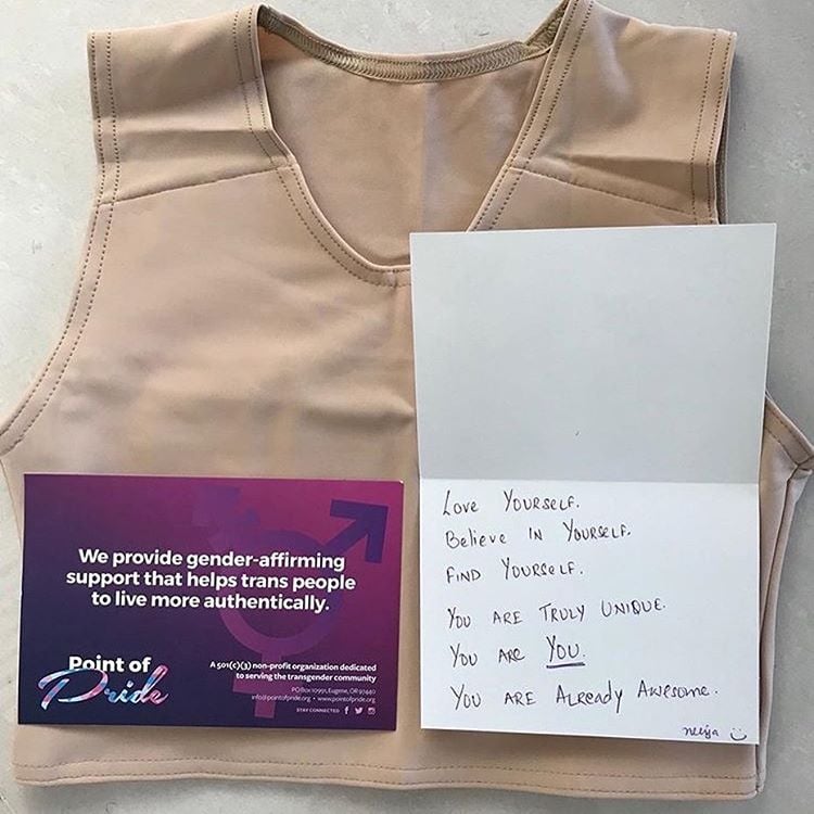 Binder with a handwritten note laying on top Binder with a handwritten note laying on top